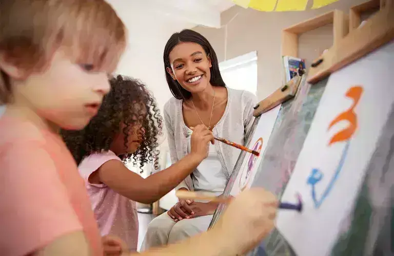 Lady working with children