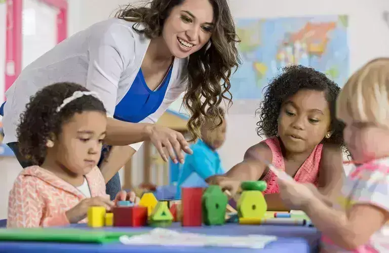 Lady working with children