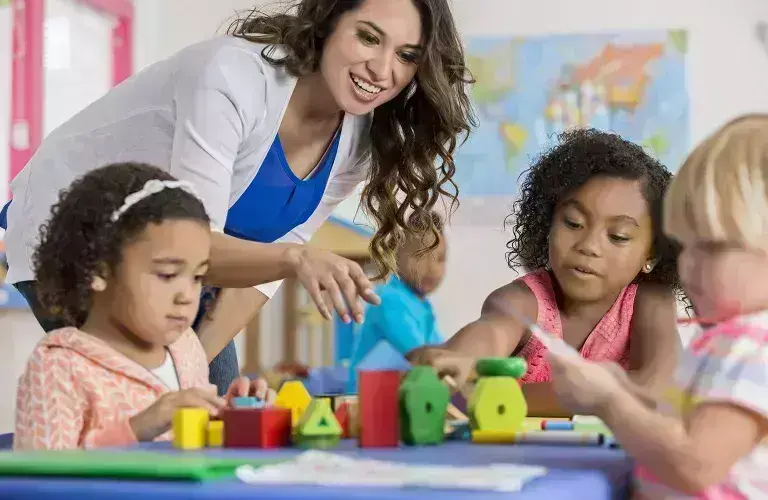 Lady working with children