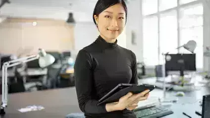 Lady holding tablet