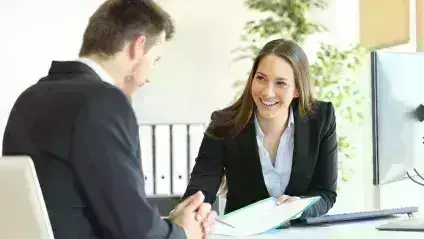 2 people in a meeting