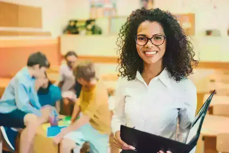 Lady smiling in front of class