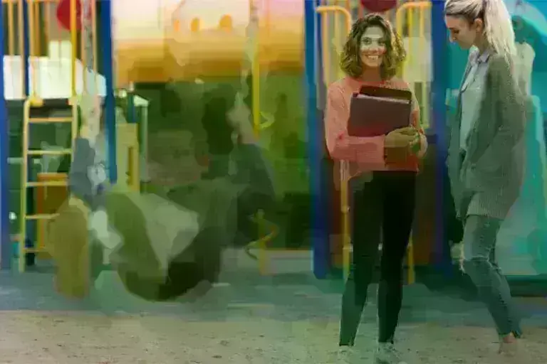 Teacher talking to parent