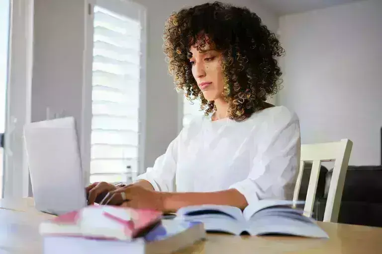 Woman working on arts and sciences