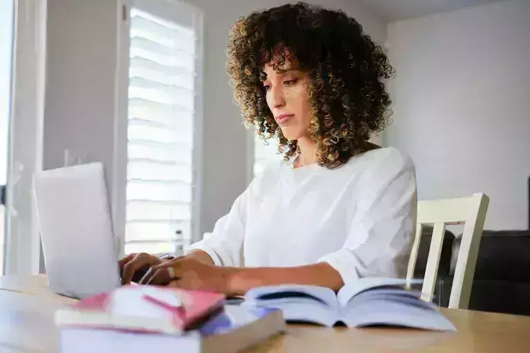 Woman working on arts and sciences