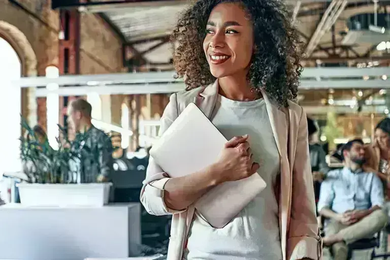 Woman walking through office