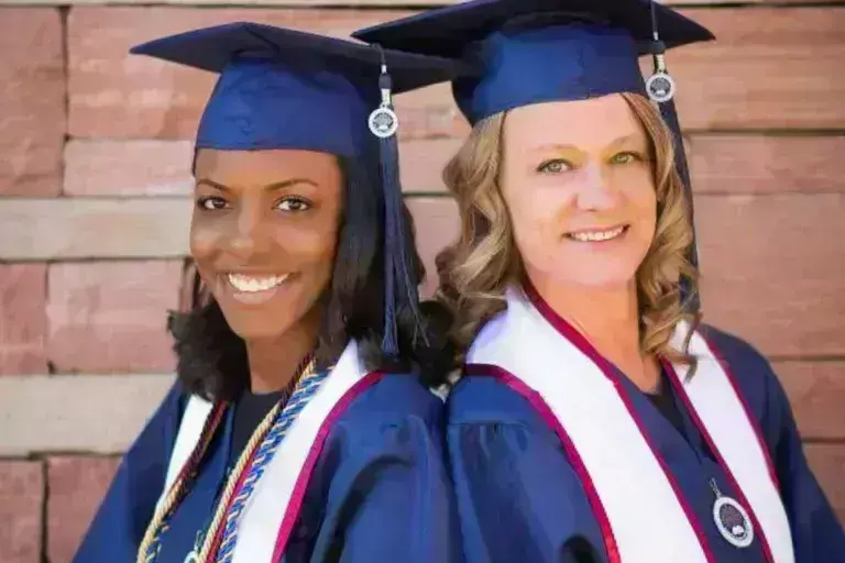 UAGC graduates posing