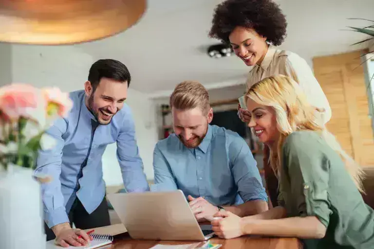 Students around a laptop